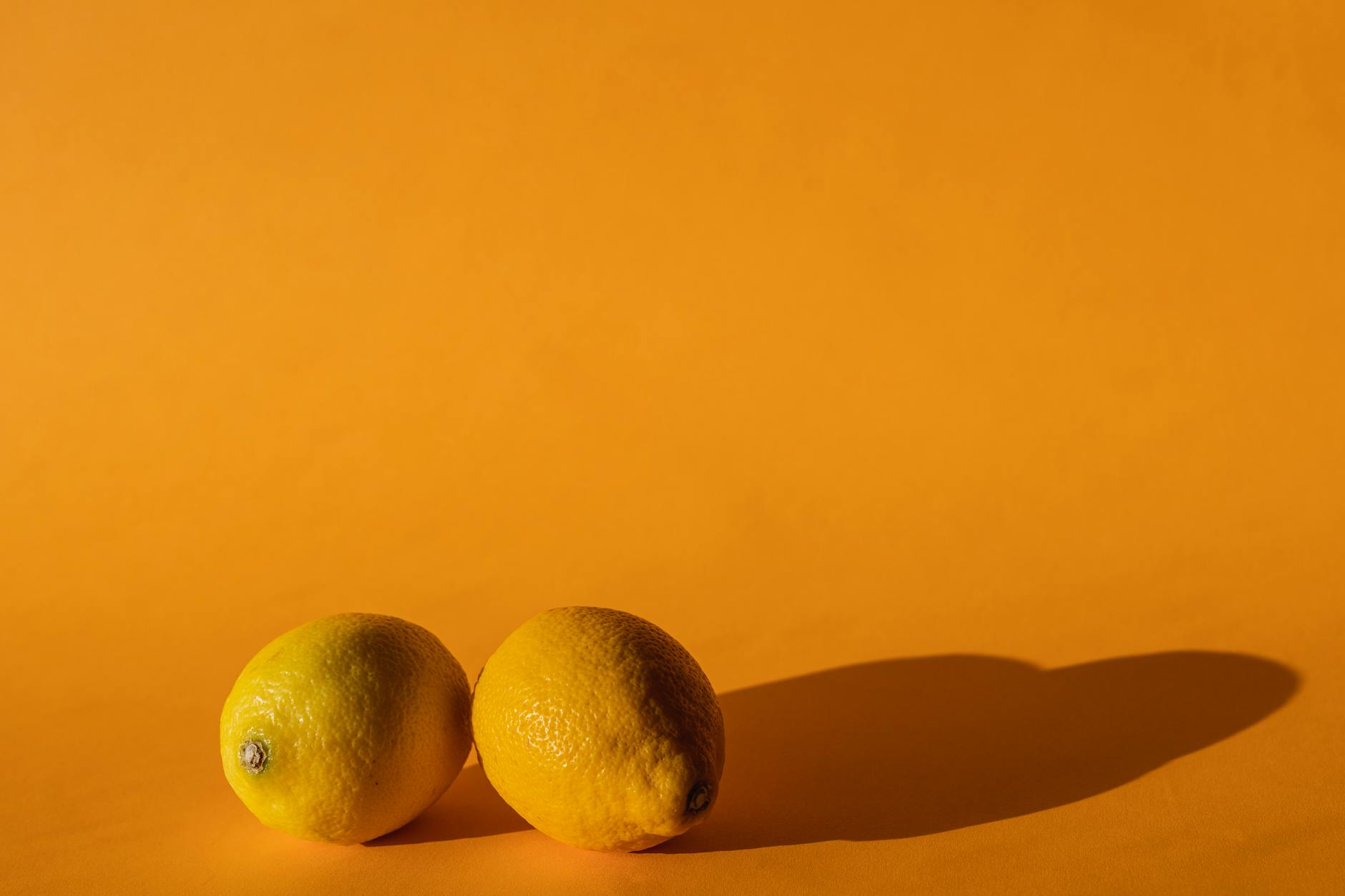 A blue lemon clitoral vibrator held in hand, symbolizing self-love and intimate reconnection